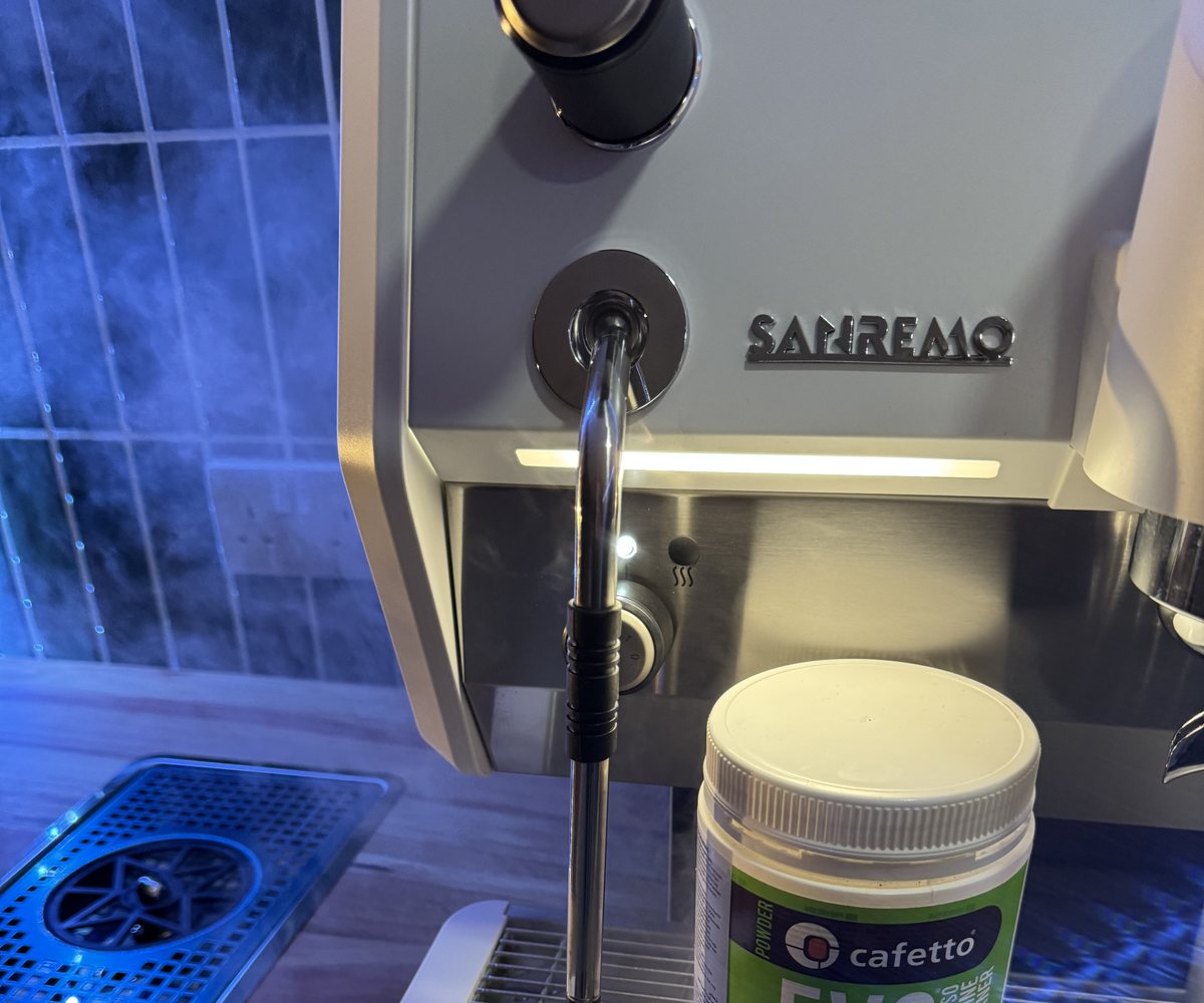 Close-up of the Sanremo steam wand and drip tray